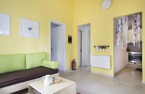 Almiros Beach Casa | Cute yellow Handmade House with tree garden