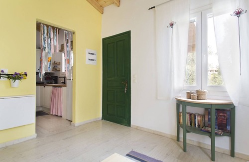 Almiros Beach Casa | Cute yellow Handmade House with tree garden