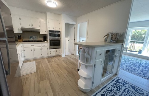 Buxton Cabaña | Cypress Cove, situated in Buxton on a soundfront lot, provides a peaceful setting in this charming rental cottage.