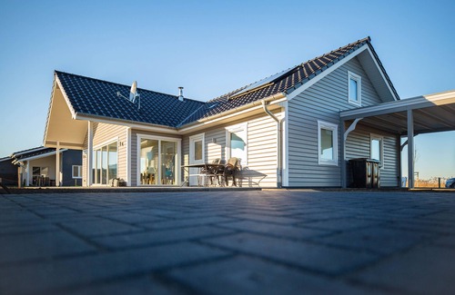 Wangerland Casa | Casa de troncos danesa directamente en Wangermeer 28 - para unas vacaciones perfectas en Norsee