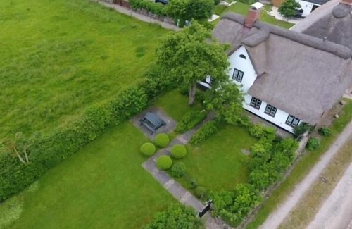 Midlum Casa | Das Petrine/s Hüüs Liegt am Ortsrand von Midlum
