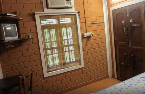 Alappuzha Cama Y Desayuno | Dazzle Dew Memories -Standard Room 1