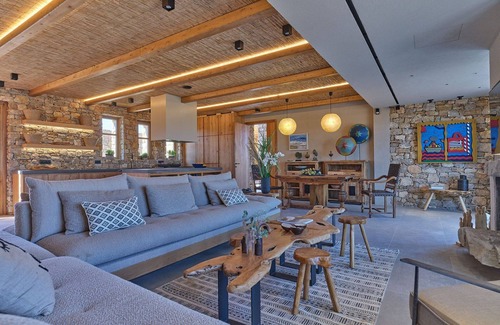 Paros Villa | Dazzling Paros Villa | Villa Acquabella | 5 Bedrooms | Private Infinity Pool with Saltwater | Upper-Level Terrace with Jacuzzi | Bar & BBQ | Molos