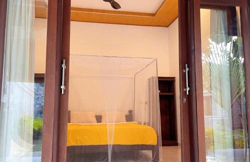 Purwakerti Cama Y Desayuno | Dea Putra DIVE HOMESTAY