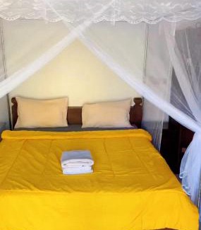 Purwakerti Cama Y Desayuno | Dea Putra DIVE HOMESTAY