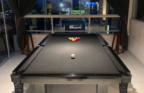 Itapoa Apartamento | Deck with pool table near the sea, Itapoá-SC 3 bedrooms