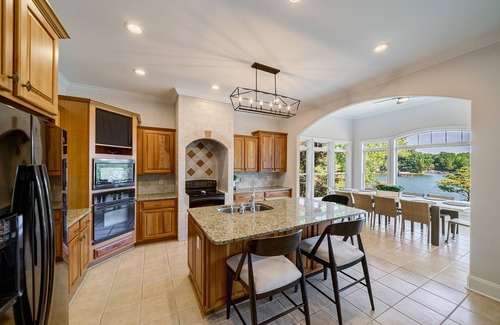 Denver Casa | Deep Water Cove - Luxury Lakefront Home with Pool, Private Dock and Beach