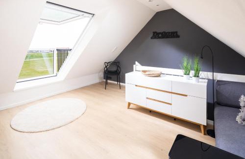 Juist Apartamento | Deichloft - mit Watt- und Hafenblick