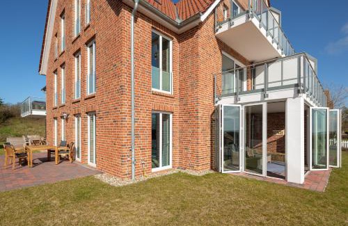 Juist Apartamento | Deichsonne - mit Wintergarten und Blick Richtung Wattenmeer