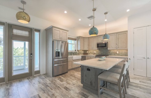 Sanibel Casa | DEJA BLUE | Lux Canal-Front Sanibel Home with Saltwater Pool and View