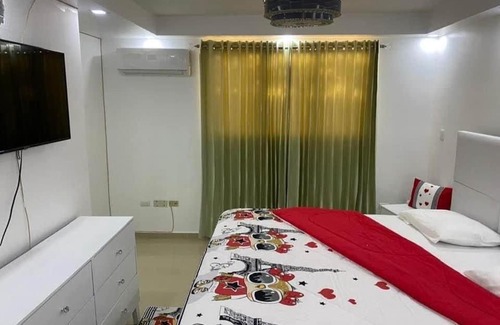 Gregorio Luperon Apartamento | Delicado apartamento con piscina.