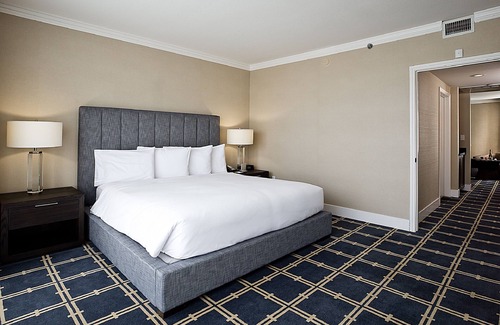 Sunnyvale West Hotel | Deluxe 1 King at The Grand Hotel, Onsite Pool, Pet-Friendly Property
