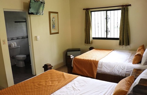 Las Guazaras Apartamento | Deluxe Room - 2 Queen Beds with Air Conditioning