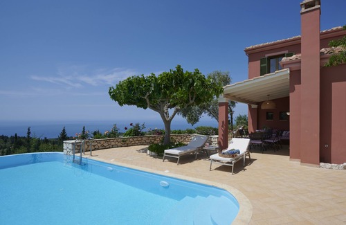 Kavallos Villa | Sofisticada villa de lujo con piscina privada, vistas panorámicas al mar y soñadora puesta de sol