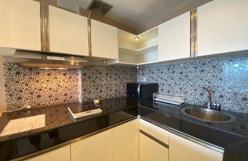 Braga Apartamento | Deluxe & Well Appointed 2BR at El Royale Apartment By Travelio