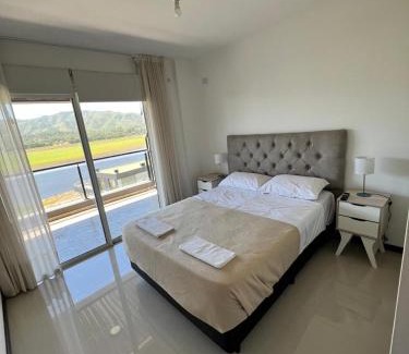 Villa Parque Siquiman Apartamento | departamento complejo Veneto Village vista al lago