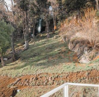San Martin de los Andes Apartamento | Depto Nómades, con vista directa a la cascada - Ayres del Bosque Alojamientos