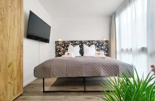 Mitte Apartamento | Design Apartment für bis zu 4 im 2 OG, modern, Dachterrasse, Grill, ruhige Lage, Disney plus, Wii, LAN und WLAN