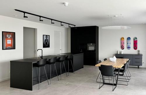 Cadzand-Bad Apartamento | Design Apartment with 60m² terrace - heated inside pool and wellness facilities - very close to the beach