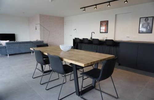 Cadzand-Bad Apartamento | Design Apartment with 60m² terrace - heated inside pool and wellness facilities - very close to the beach