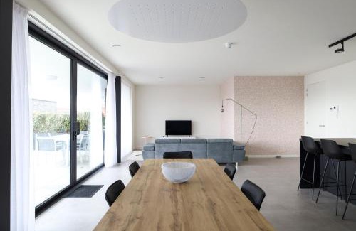 Cadzand-Bad Apartamento | Design Apartment with 60m² terrace - heated inside pool and wellness facilities - very close to the beach