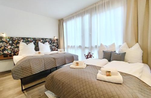 Mitte Apartamento | Design-Apartmenthaus für bis zu 12, modern, Dachterrasse, Grill, ruhige Lage, Disney plus, Wii, LAN und WLAN