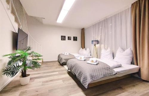 Mitte Apartamento | Design-Apartmenthaus für bis zu 12, modern, Dachterrasse, Grill, ruhige Lage, Disney plus, Wii, LAN und WLAN
