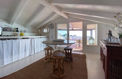 Porto Rotondo Apartamento | Designer apartment overlooking the bay. Shared pool, access to the sea