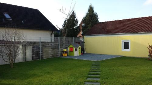 Buttenheim Apartamento | Die Buttenheim Lodge - Familienfreundliche Ferienwohnung mit Garten