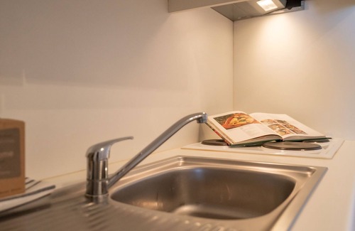 De Haan Apartamento | Dina with parking and shared pool by Interhome