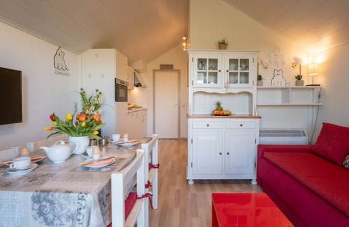 De Haan Apartamento | Dina with parking and shared pool by Interhome