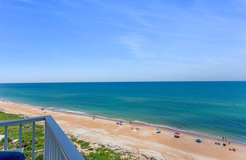 Seawinds Condo Condominio | Direct oceanfront condo with large private balcony, seasonally heated pool, and garage parking