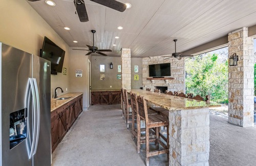 Concan Casa | Directly ON the Frio River, private golf cart/walking path, hot tub, swimming pool, 3 master suites
