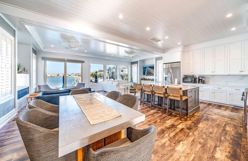 Stone Harbor Casa | Discover an extraordinary waterfront haven with this magnificent bayfront residence that boasts a.