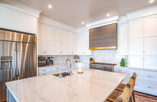 Stone Harbor Casa | Discover an extraordinary waterfront haven with this magnificent bayfront residence that boasts a.
