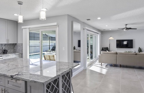 Haines City Casa | Disney Poolside Paradise for Relaxation, Celebration & Work