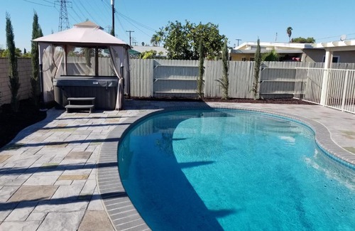 Southwest Anaheim Casa | Disneyland & Knotts Close! Hot Tub, Mini Golf, private pool, gameroom