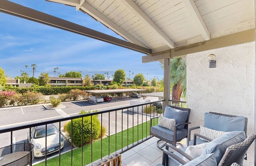 Baristo Condominio | Dive into Palm Springs fun with a stylish home base featuring poolside lounging.