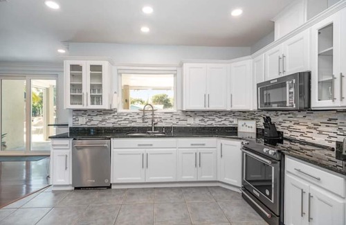 Cocoa Beach Casa | Dock, Kayaks, Pool, JACUZZI, ping pong, billiards, all beach gear, and more!