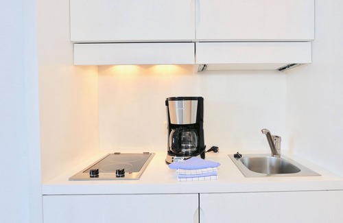 Juist Apartamento | Dog and family-friendly apartment with sauna and swimming pool, centrally located