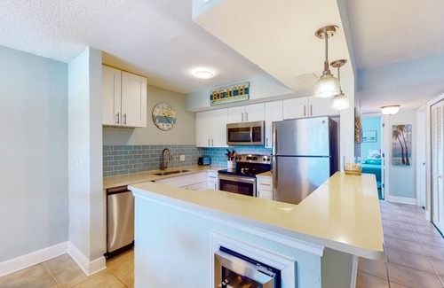 North Redington Beach Condominio | Dog-friendly condo with pool, fitness area, balcony, fast WiFi, & W/D