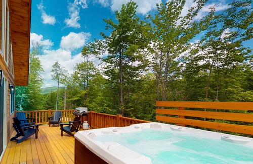 Carrabassett Valley Cabina | Dog-friendly home with large deck, hot tub, great views, & gas fireplace