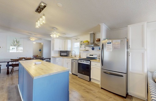 Montego Bay Casa | Dog-friendly, canal-front home with community pool & tennis, dock, & WiFi