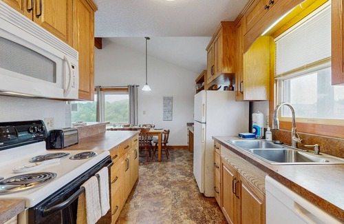 Brigands' Bay Casa | Dog-friendly, canal-front house with dock, balcony, deck, & central AC