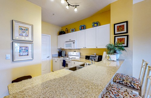 Frangista Beach Condominio | Dog-friendly condo with pool, hot tub, private balcony, AC, & washer/dryer