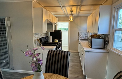Sunland Casa | Dog friendly cottage with porch, pool, massive yard, and plenty of parking.
