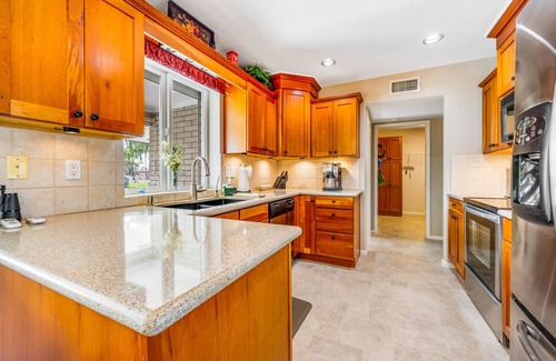 Sunland Village East Casa | Dog-friendly, golf course adjacent home with a pool, hot tub, & fitness center