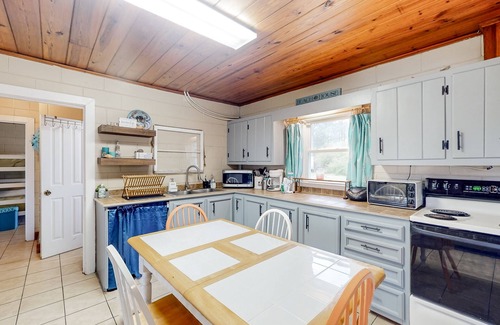 Morehead City Casa | Dog-friendly home near water with foosball, bikes, grill, outdoor shower, & W/D