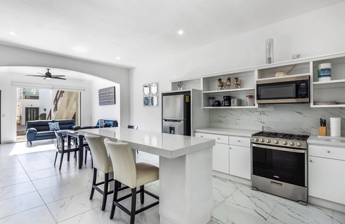 La Paloma Casa | Dog-friendly retreat with ocean-view rooftop deck, pool, hot tub, & kitchen
