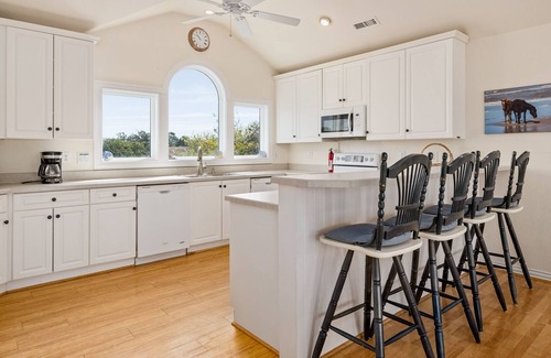 Monteray Shores Casa | Dog-friendly sound-front home with pool, fireplace, game room & washer/dryer